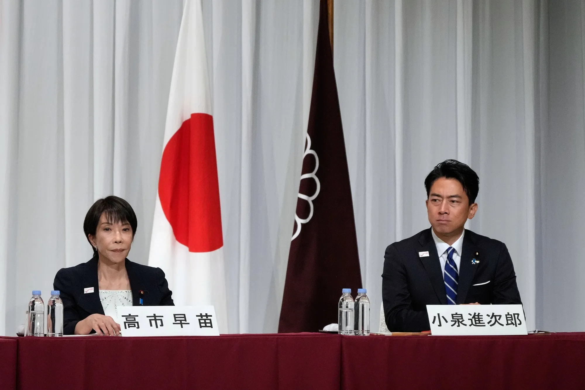 Sanae Takaichi, left, and Shinjiro Koizumi, during a news conference on Sept. 23.