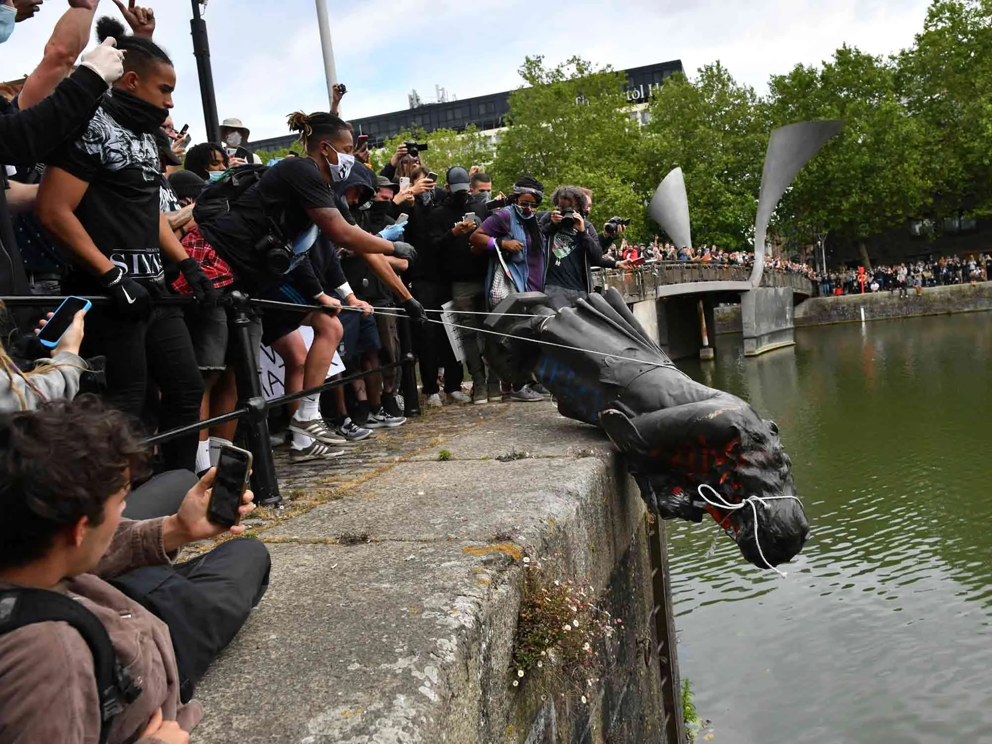 Protesters throw a statue of Edward Colston into Bristol Harbour on&nbsp;June 7, 2020.