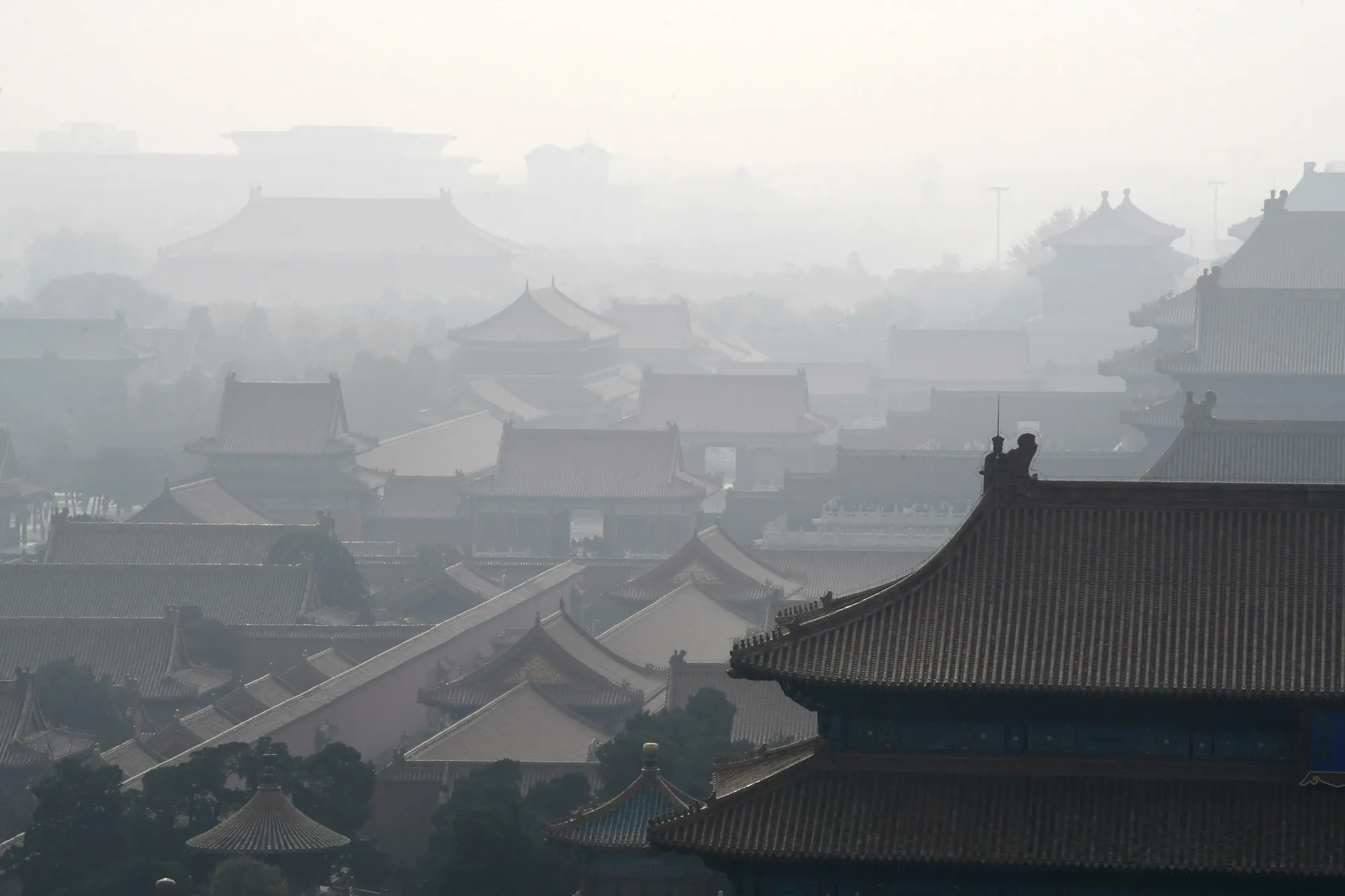 The Forbidden City shrouded in smog in Beijing, China.