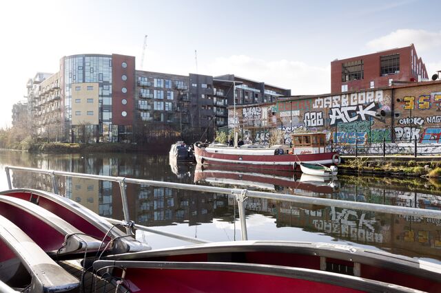 The River Lee Navigation at its intersection with the Hertford Union Canal in the Hackney Wick neighborhood of London. 