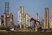 Views Of Tankers & Refineries As Oil Trades Near 12-Year Low