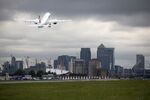 A passenger aircraft, manufactured by Bombardier Inc takes off at London City Airport.
