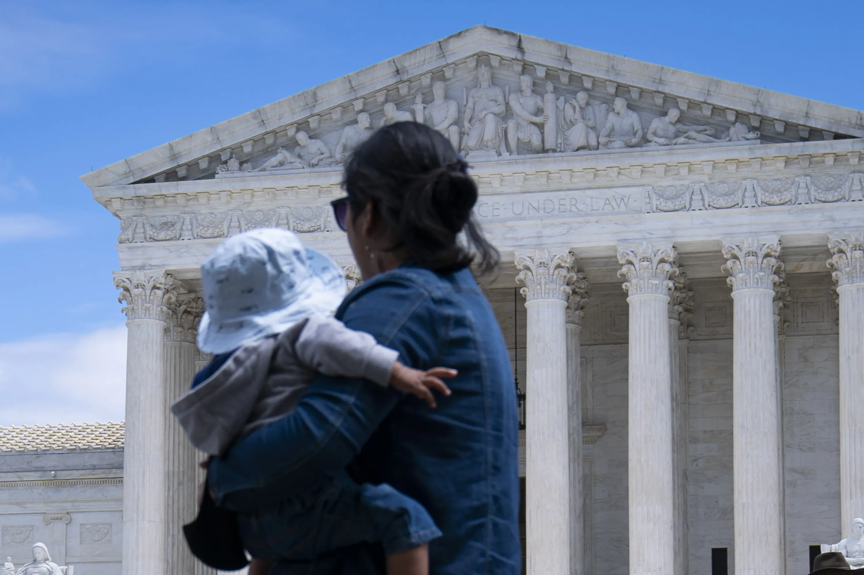 Trump would restrict that to babies with at least one parent who is a US citizen or green card holder.