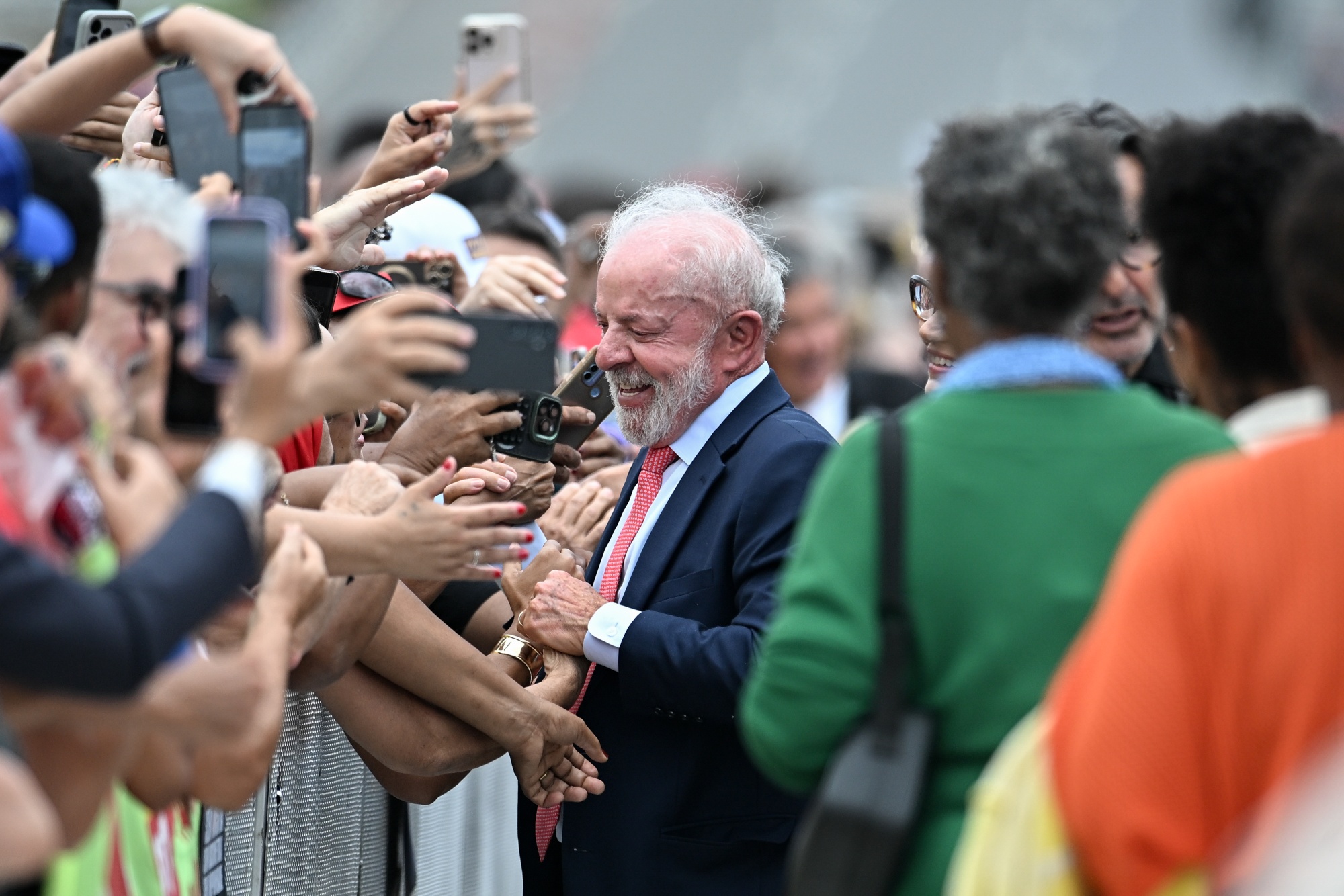 Luiz Inacio Lula da Silva, Brazil's president, arrives for a ceremony to commemorate three years since an attempted coup, at Planalto Palace in Brasilia, Brazil, on Thursday, Jan. 8, 2026. Brazil's Supreme Court last September sentenced Jair Bolsonaro to 27 years and three months in prison for plotting a coup after his 2022 election defeat, making him the first former president convicted of such a crime in a nation long scarred by successful and failed power grabs. Photographer: Ton Molina/Bloomberg