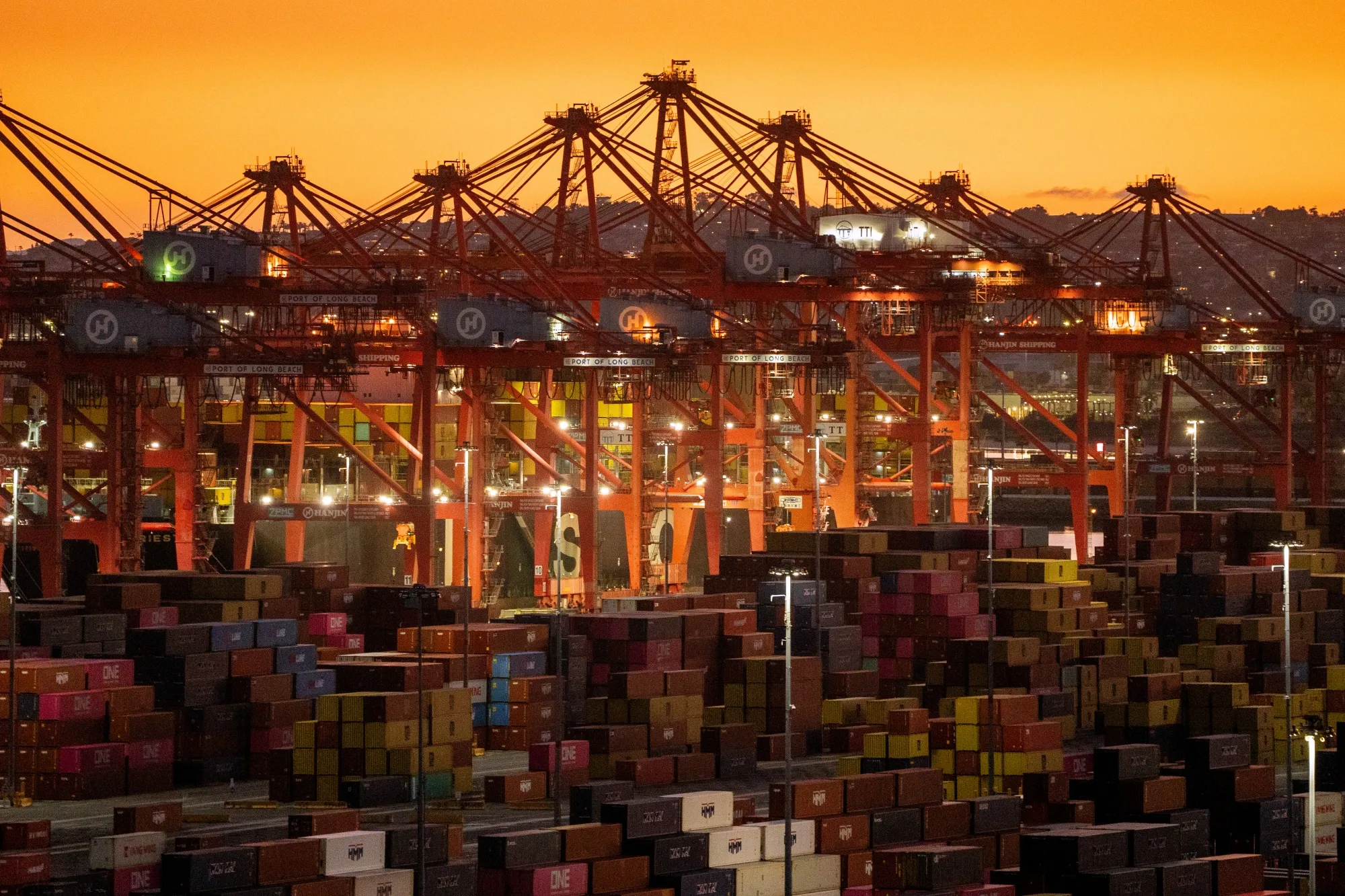 Cranes and shipping containers at the Port of Long Beach in Long Beach, California, on Feb. 20.