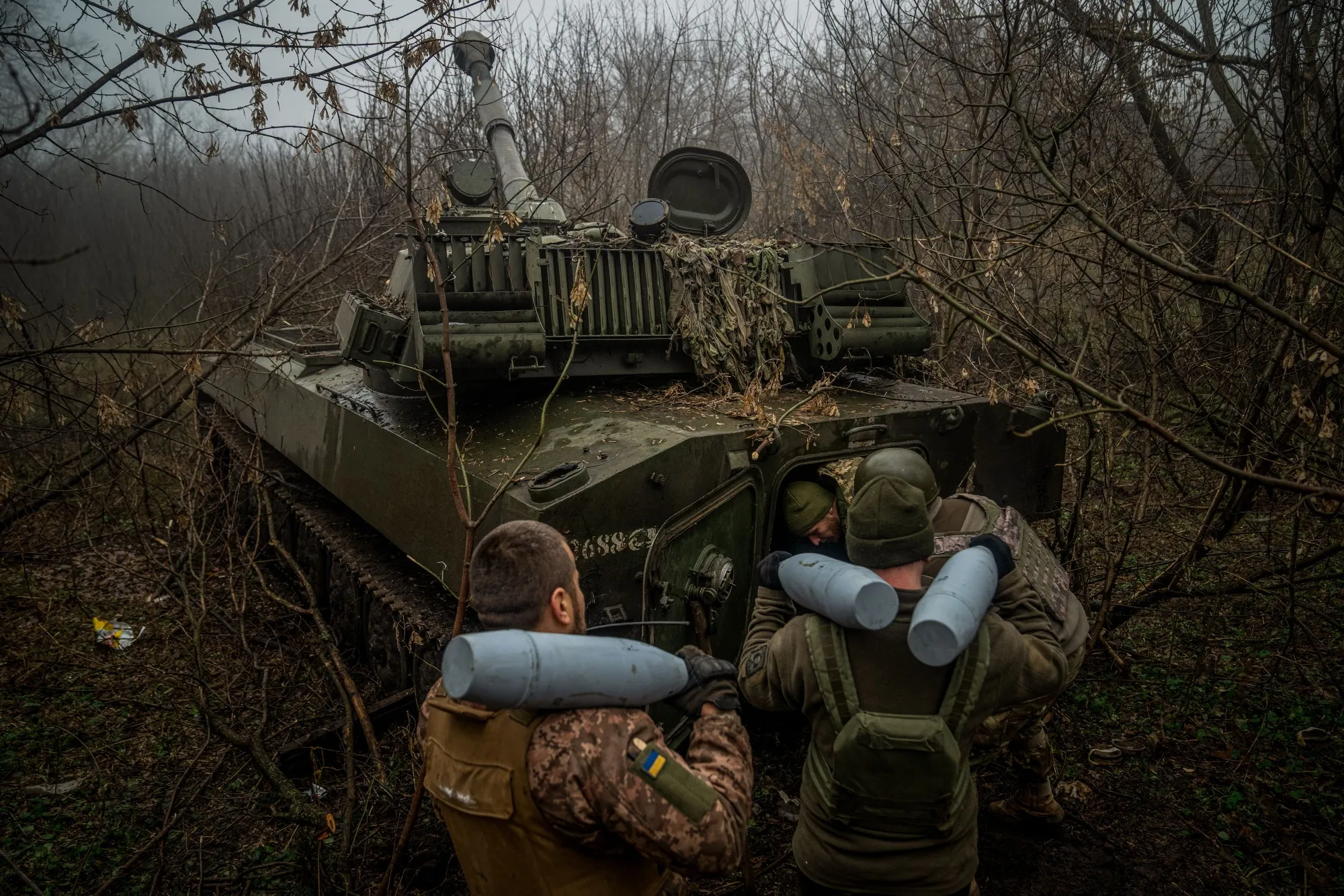 Ukrainian artillerymen load ammunition into&nbsp;howitzer near&nbsp;Bakhmut, Ukraine.&nbsp;