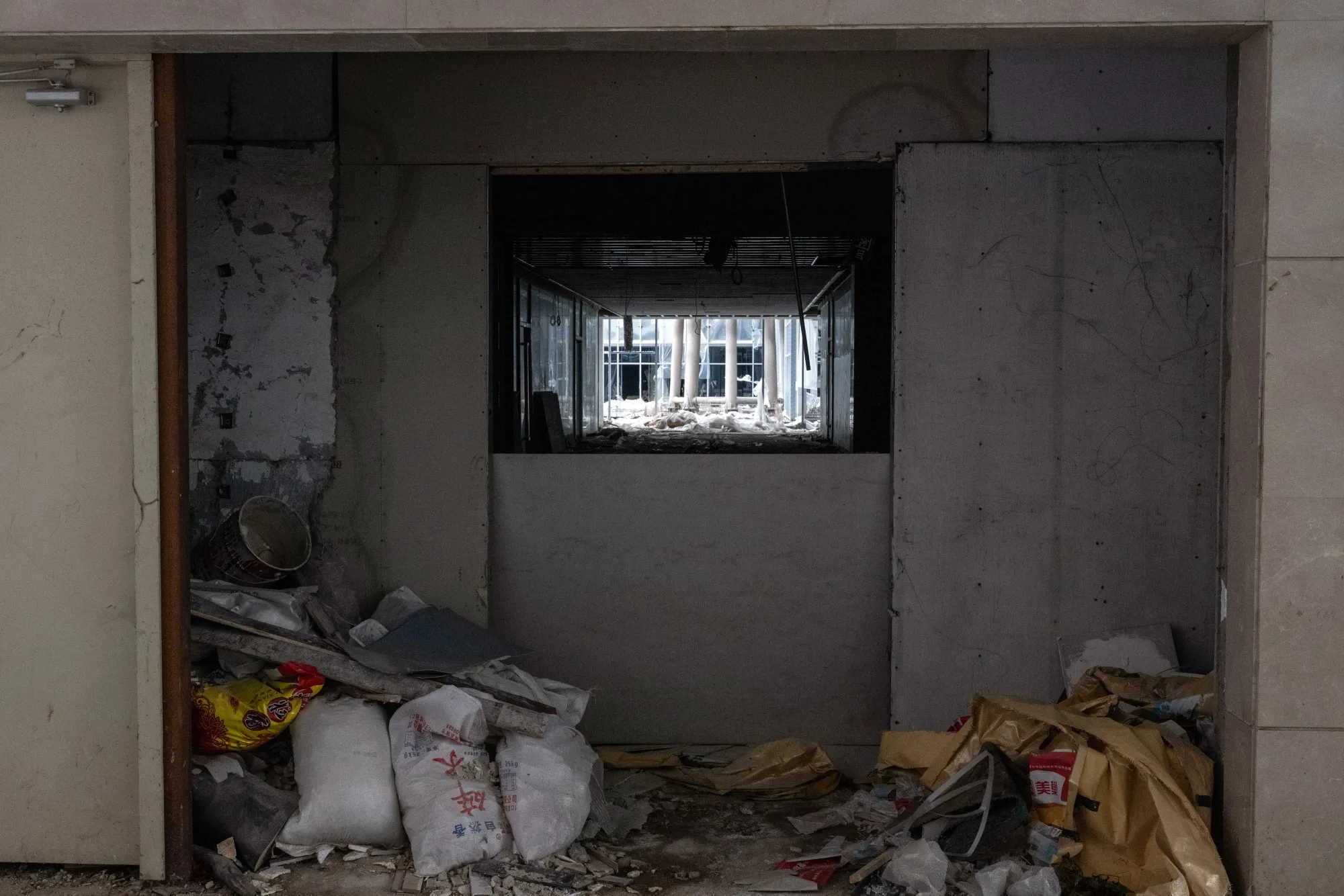 An abandoned construction site at the near-deserted Evergrande City Plaza shopping mall, developed by China Evergrande Group, in Beijing.