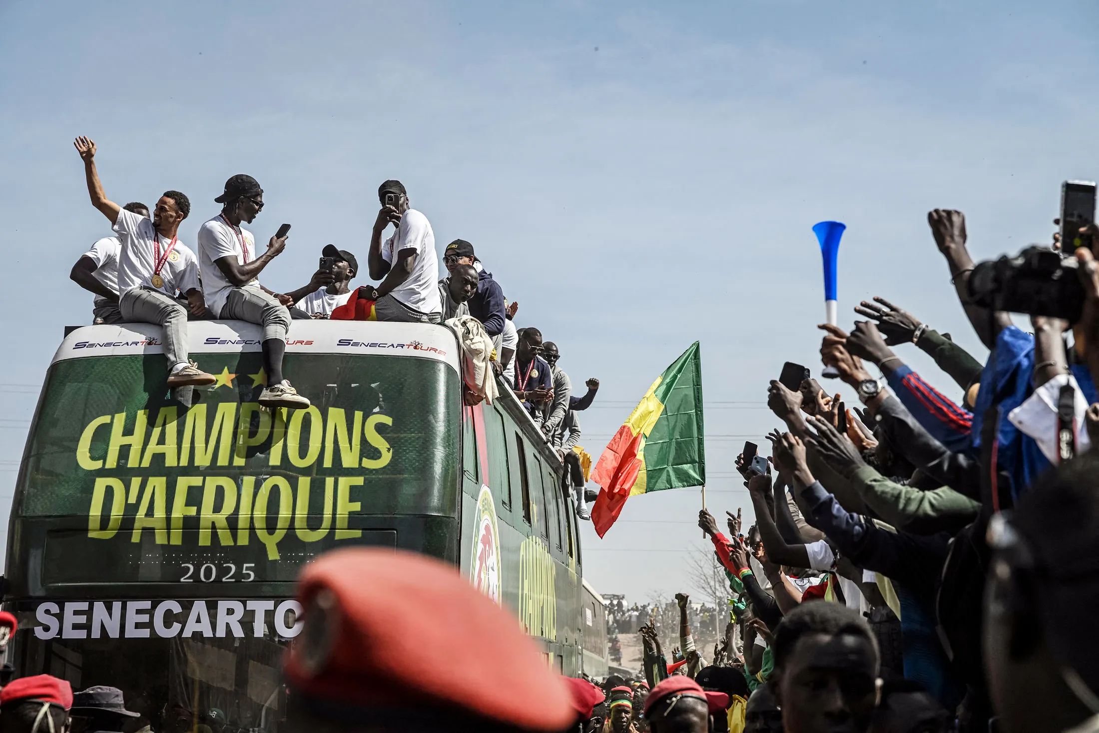 Senegal's national football team greets supporters during a trophy parade in Dakar, on Jan. 20.
