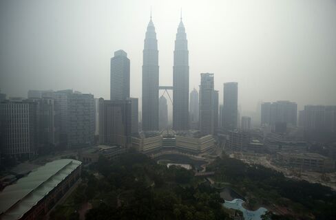 The Kuala Lumpur skyline shrouded by haze, on Sept. 14, 2015.