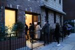 A crowd gathers in front of an open house for a rental unit in Williamsburg, Brooklyn, on Feb. 11.