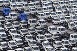 Trucks at a port in Yokohama, Japan. Photographer: Toru Hanai/Bloomberg