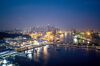 Buildings stand illuminated at the harbor front area with the central business district in the background in Singapore, on Saturday, June 9, 2018. U.S. President Donald Trump and North Korean leader Kim Jong Un will hold their historic Singapore summit at the Capella Hotel on the city-states Sentosa Island on June 12.