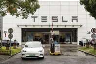 Tesla Dealership and Supercharger Stations