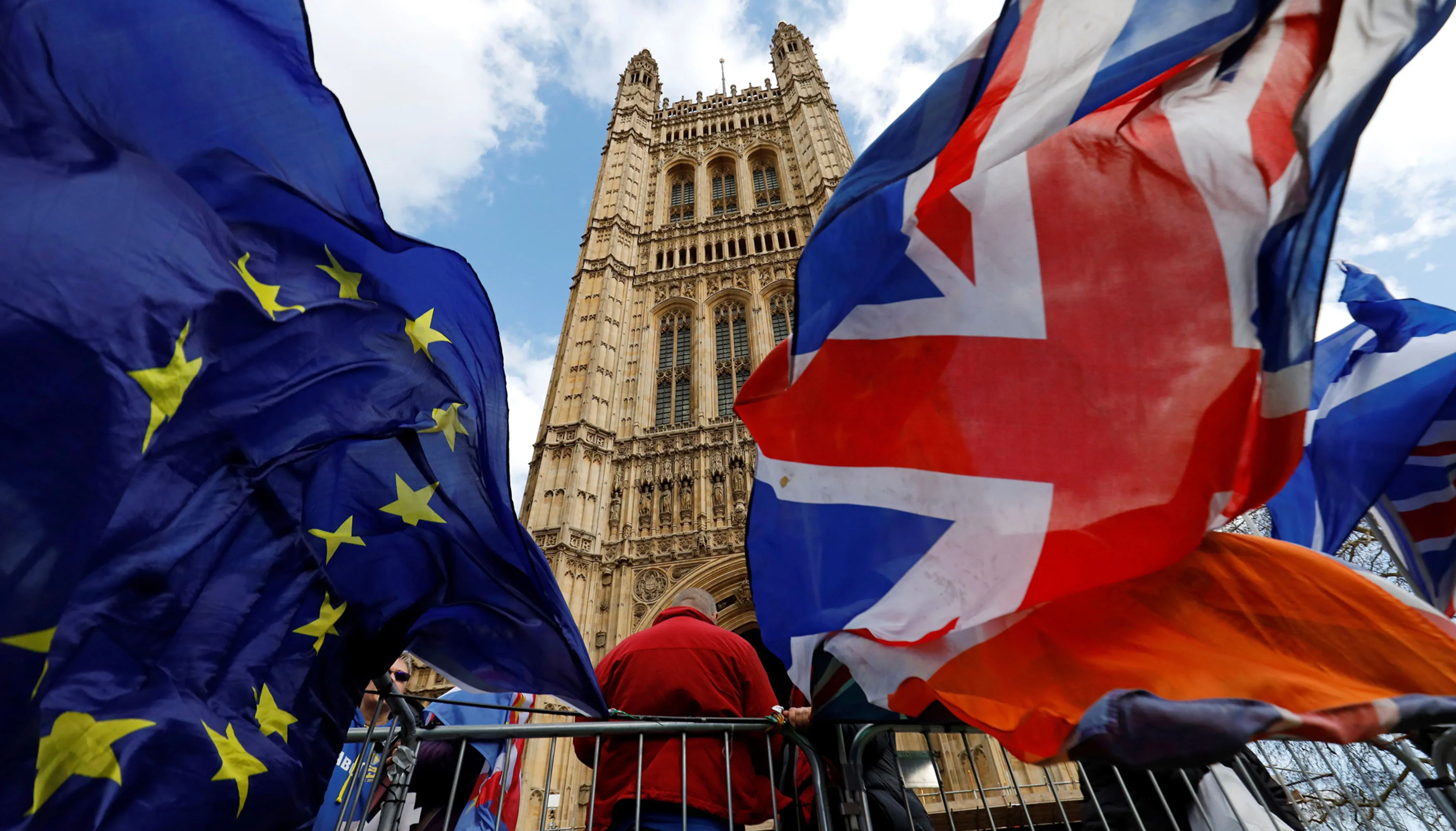 Pro-Brexit and anti-Brexit protesters demonstrate outside the Houses of Parliament in London on March 14.&nbsp;