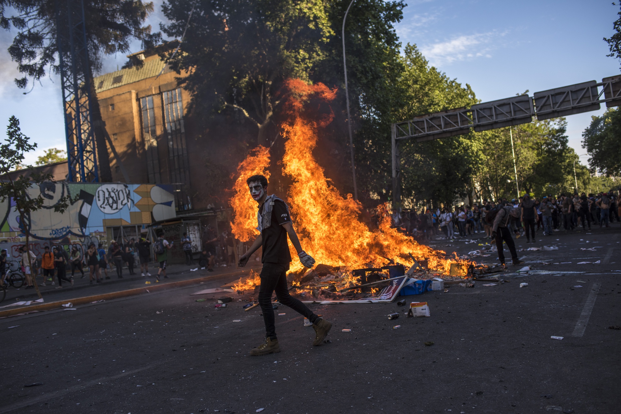 Fire burns on a street during a protest in Santiago, Chile, on&nbsp;Oct. 21, 2019.&nbsp;