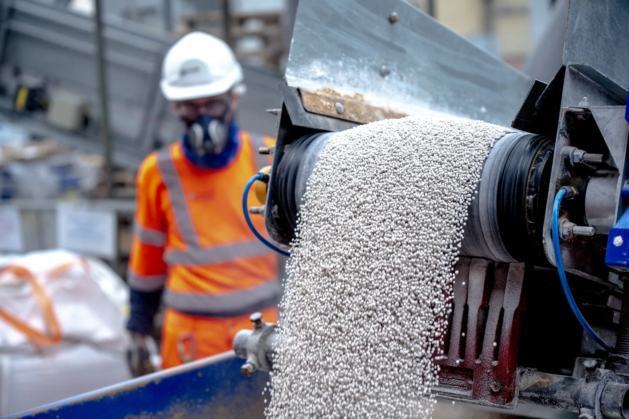 Polyhalite fertilizer is poured into bags after processing at the&nbsp;Woodsmith Project&nbsp;in North Yorkshire, UK.