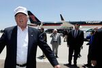 Republican presidential hopeful Donald Trump speaks after arriving at the airport for a visit to the U.S. Mexico border in Laredo, Texas, on July 23, 2015. Trump is touring the border area to highlight his concerns about immigration policies.
