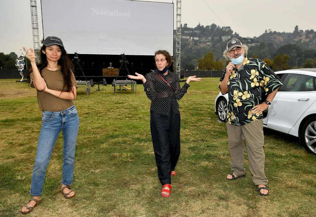 Inadvertent cold warriors (L-R) Chloé Zhao, Frances McDormand, and Fox Searchlight Co-Chairman Stephen Gilula.