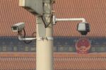 Chinese are used to being watched.
