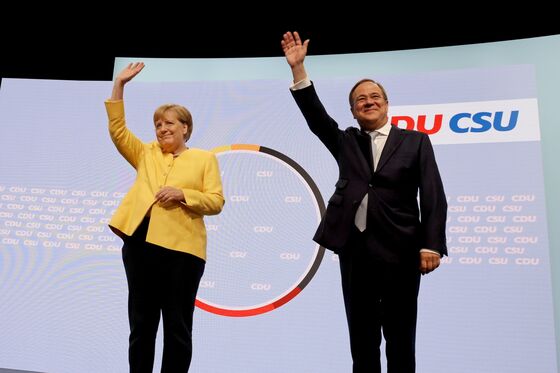 Merkel Rallies Conservatives to Fight for Embattled Successor