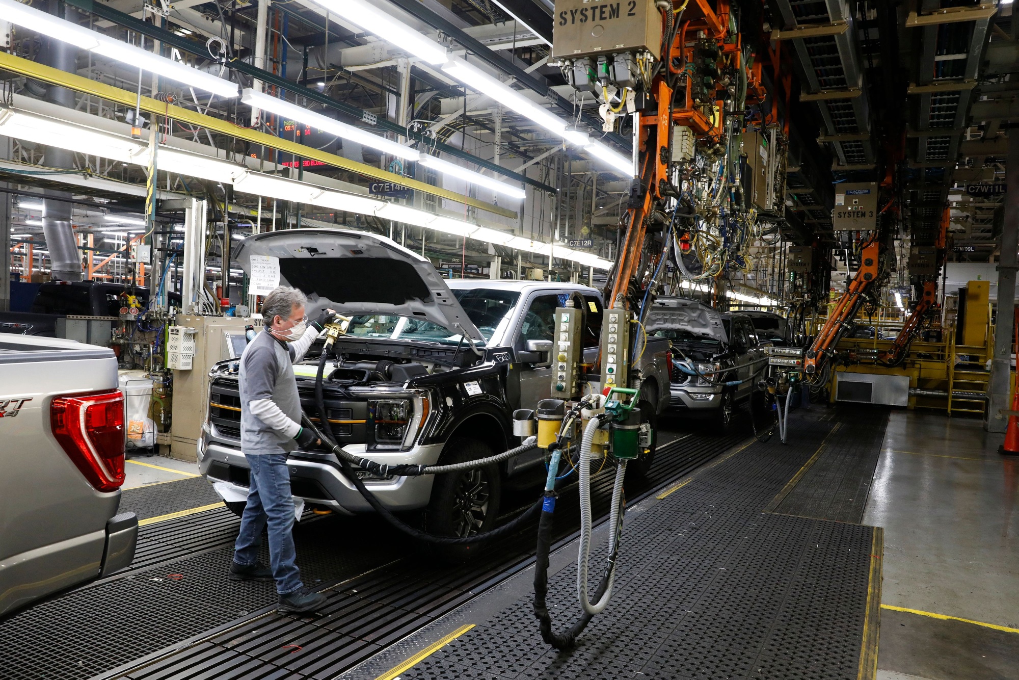 An employee works on a Ford Motor Co. F-Series truck&nbsp;at the Ford Dearborn Truck Plant&nbsp;in Dearborn, Michigan.&nbsp;
