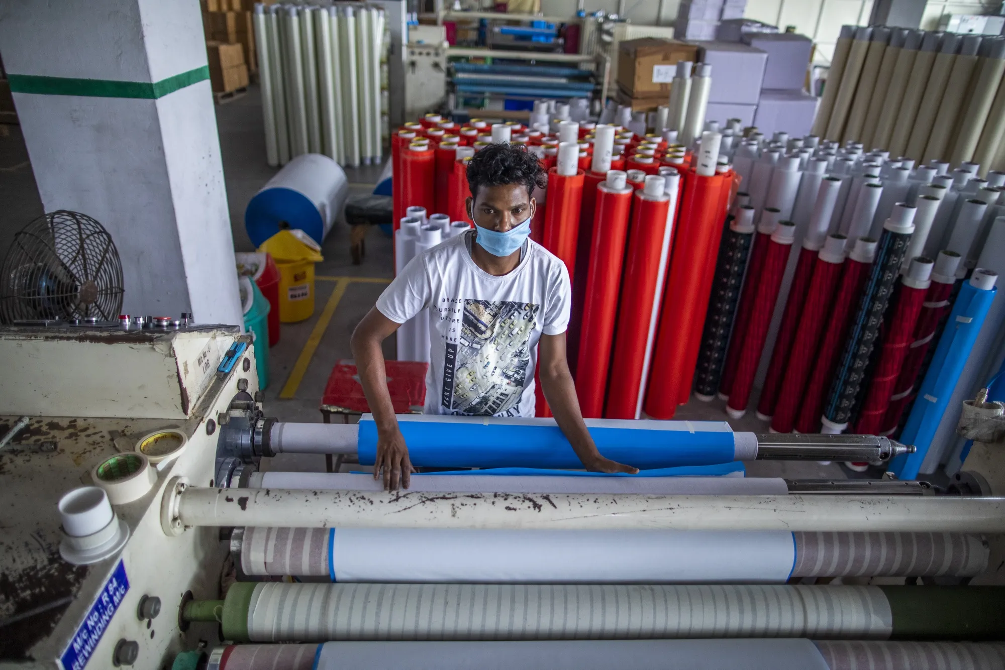 A worker&nbsp;at Ajit Industries in India in April.