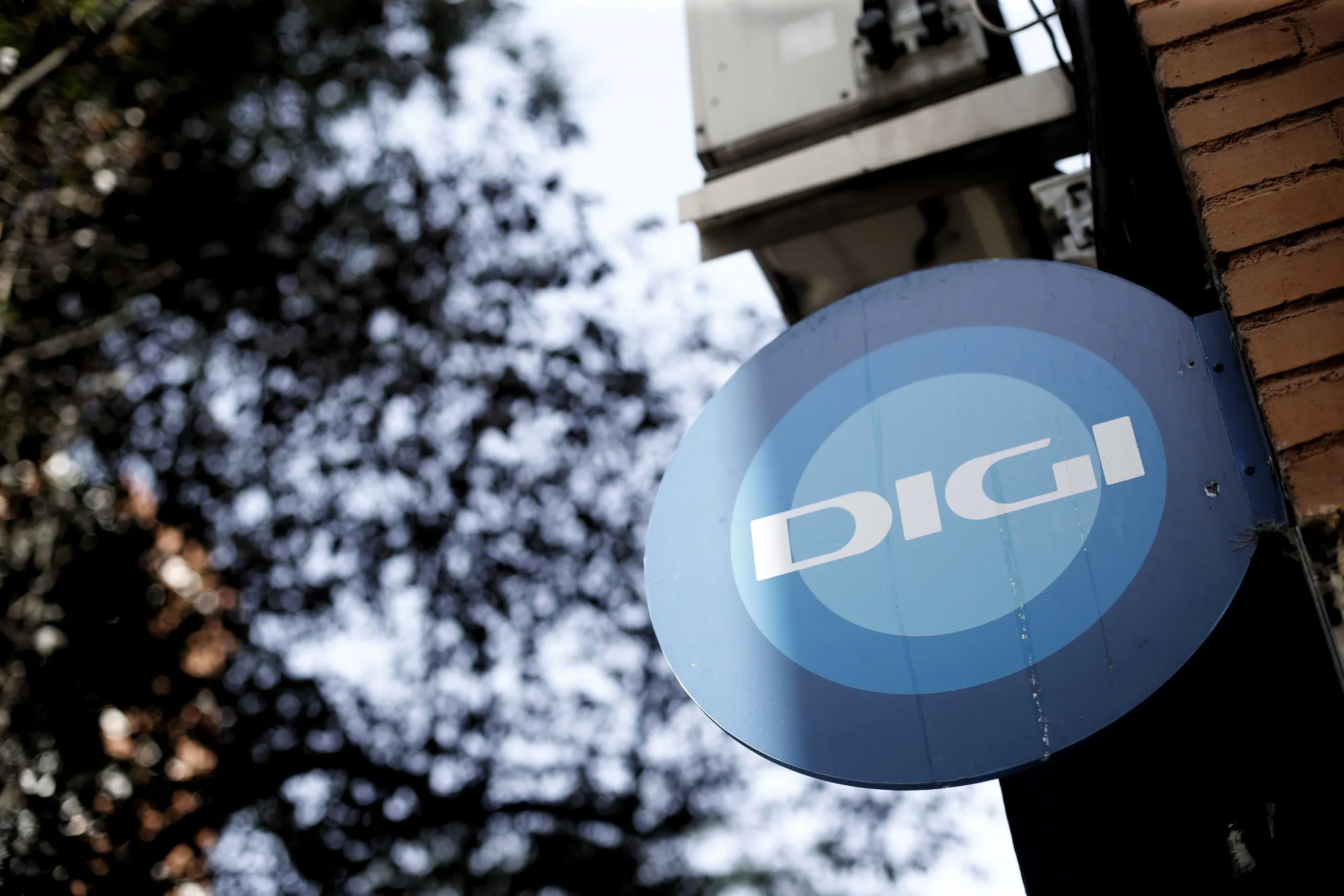 The Digi mobil logo outside a store in Madrid.