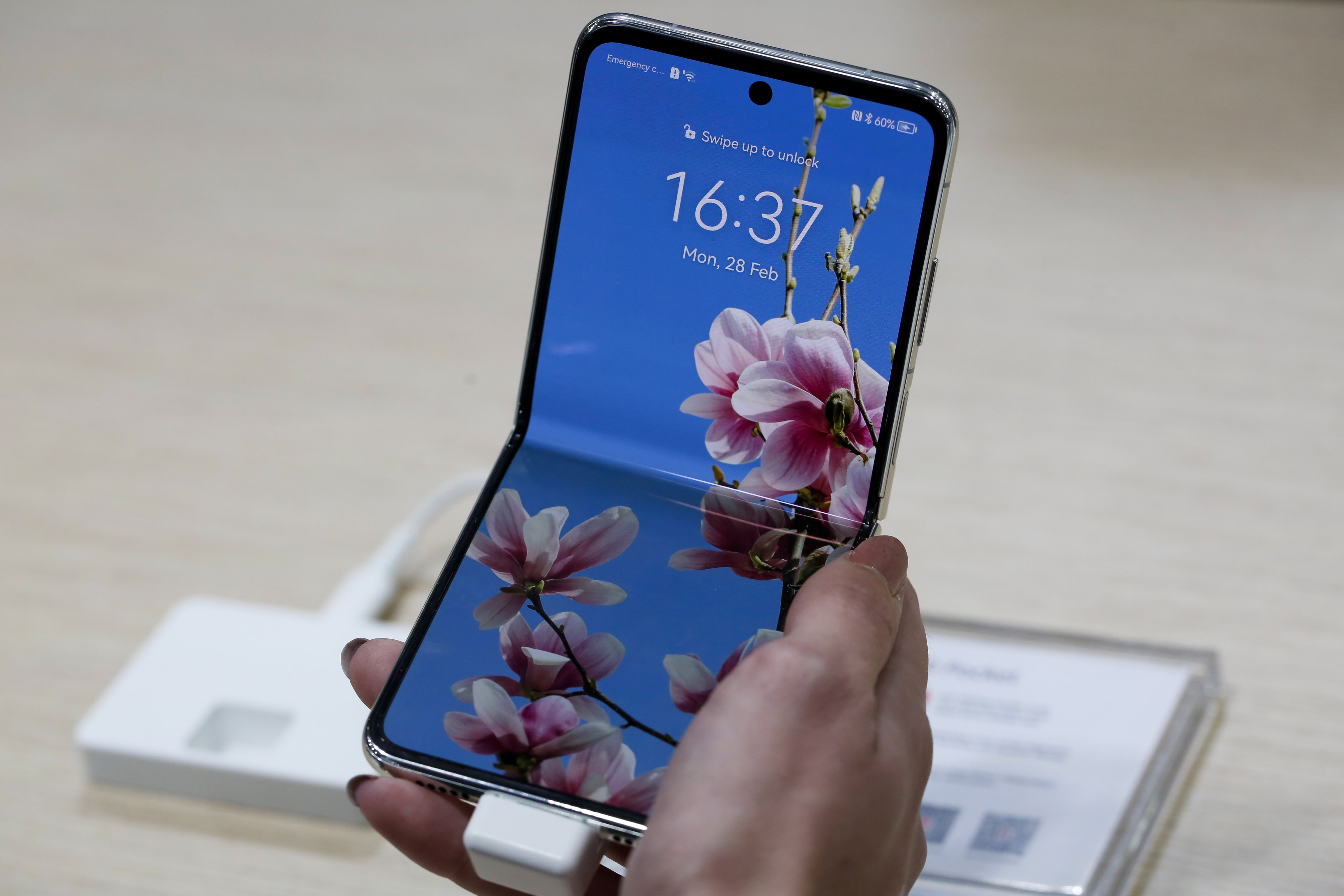 Huawei Books First Sales Rise Since US Sanctions Hit Its Phones - Bloomberg