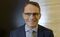 Portraits of BHP Billiton CEO Andrew Mackenzie as Company Reports Full-Year Results
