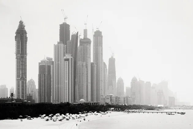 Jumeirah Beach in Dubai, with marina skyscrapers under construction in the background