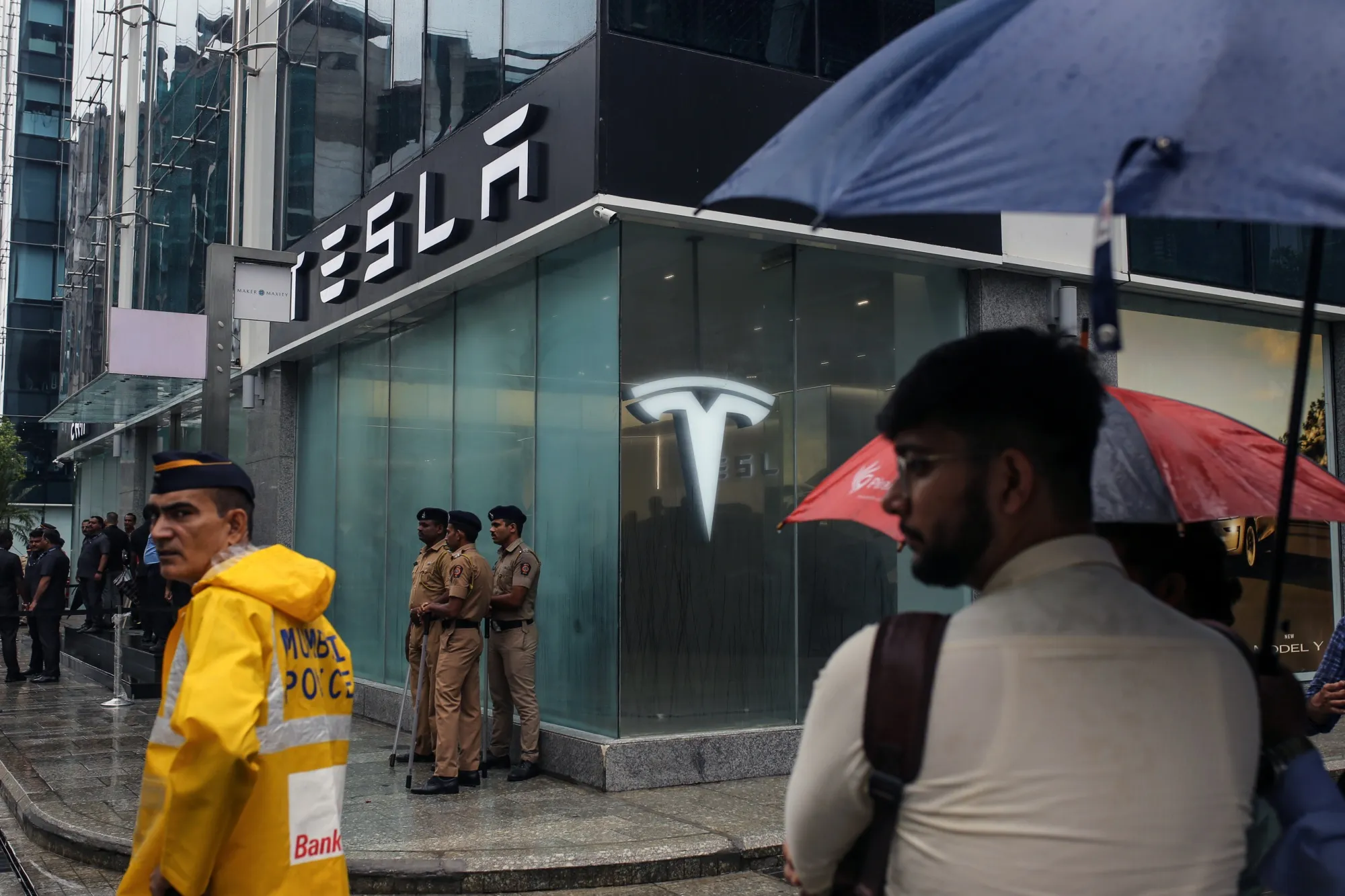 Security outside the new Tesla store at Bandra Kurla Complex in Mumbai on July 15.
