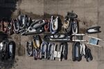 Dinghies, used by migrants to cross the channel, sit in a storage facility in Dover, U.K.