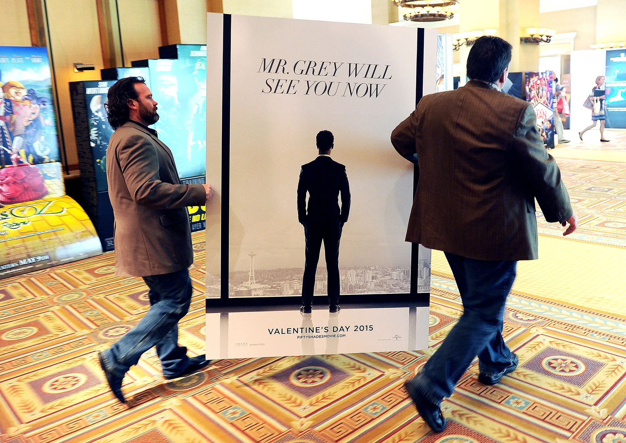 An ad for the upcoming film Fifty Shades of Grey during CinemaCon 2014 on March 25, 2014, in Las Vegas.
