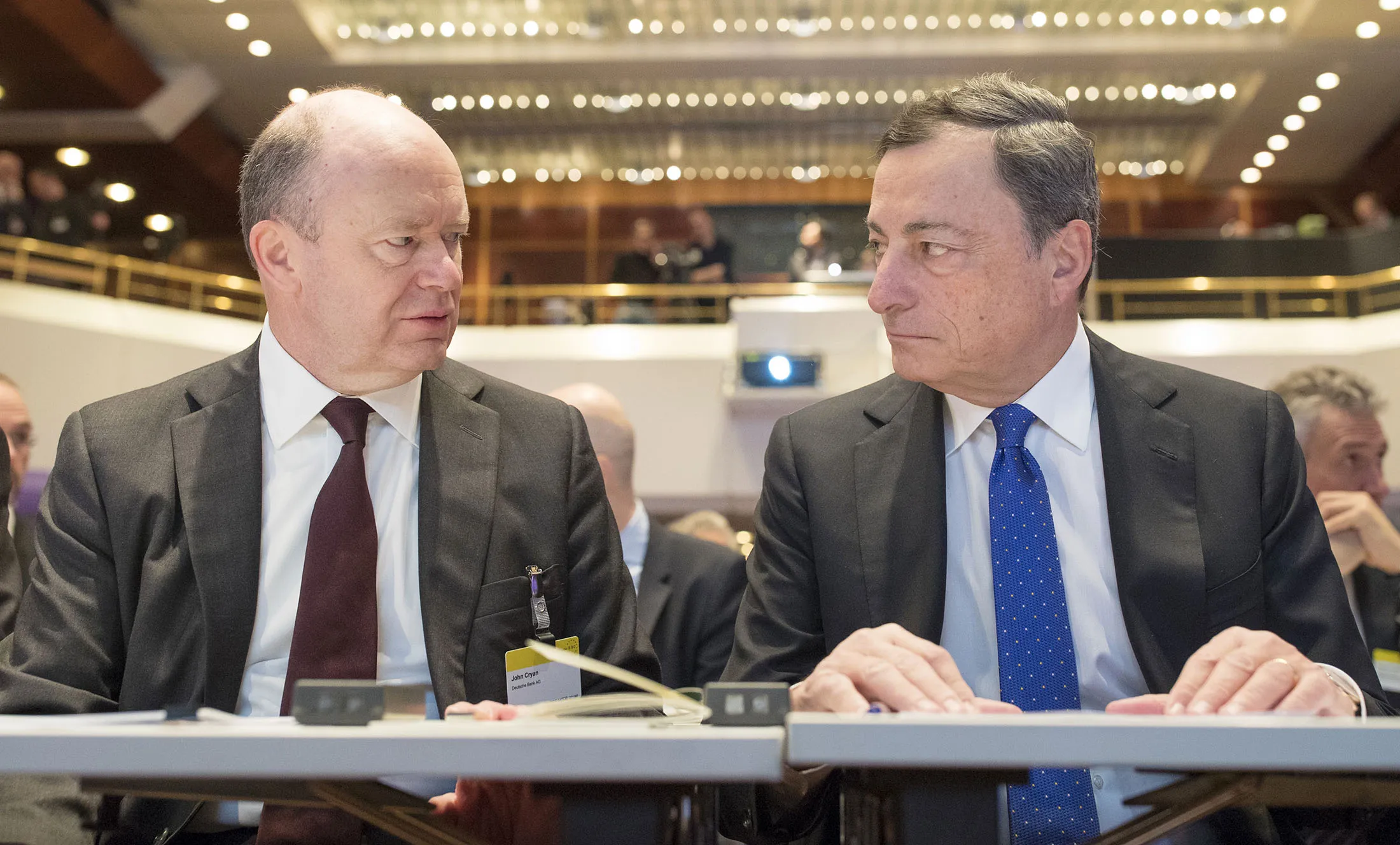 John Cryan speaks with Mario Draghi on Nov. 18.
