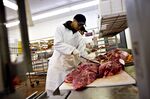 Manny Vasquez works in the meat department at a Royal Ahold NV Stop & Shop supermarket in New Rochelle, New York, U.S., on Wednesday, March 3, 2010. 