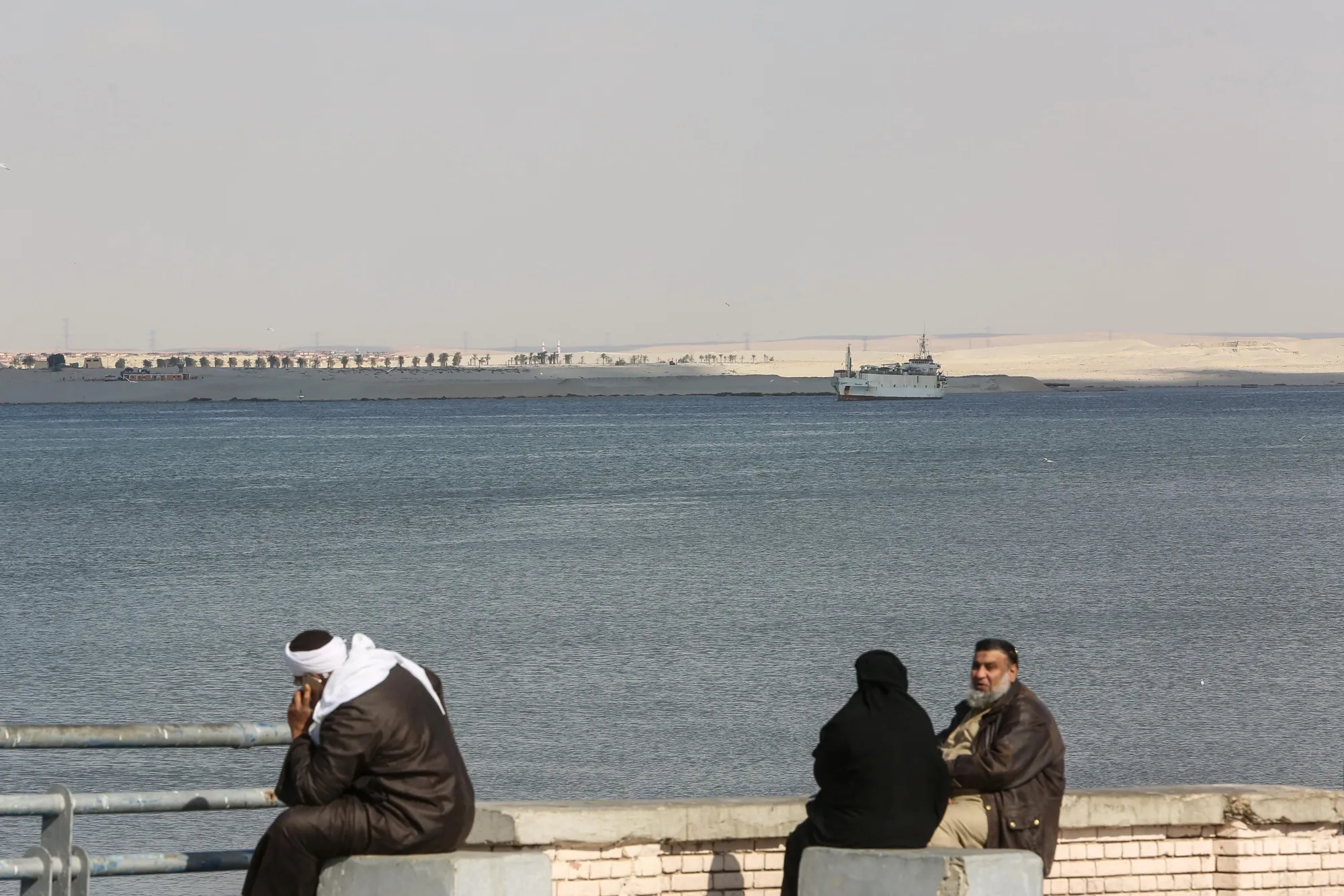 A cargo vessel rides anchor while awaiting transit through the Suez Canal in Ismailia, Egypt, on Thursday, March 25, 2021.