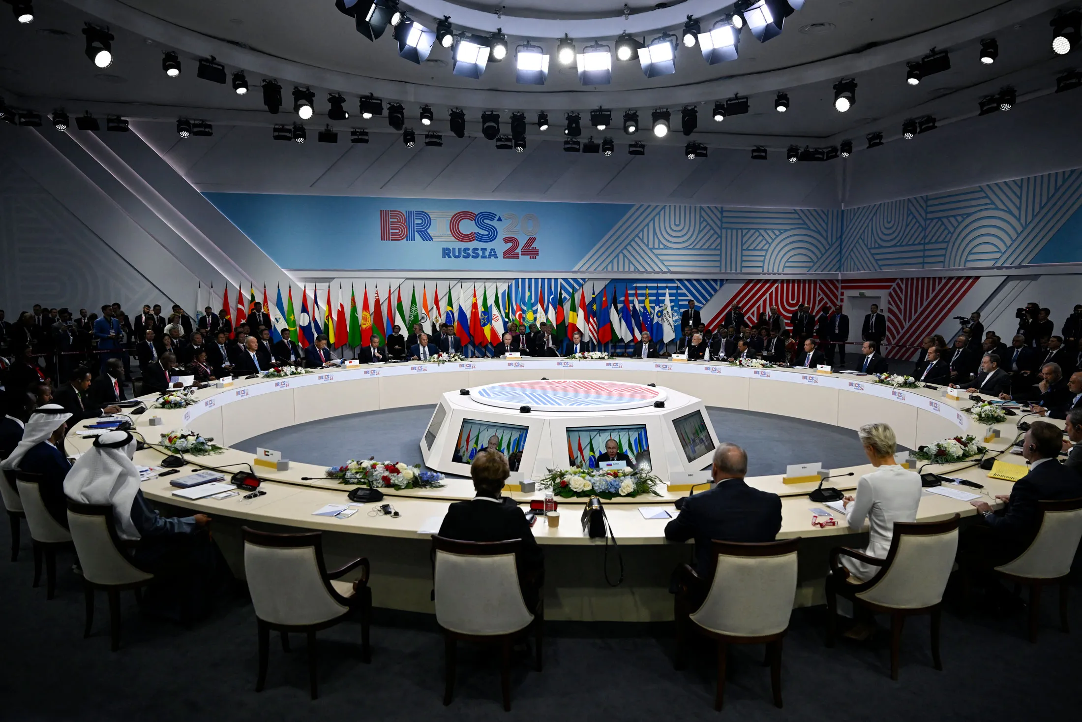 Vladimir Putin, center, during the BRICS summit in Kazan, Russia, on Oct. 23.