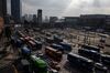 Vehicles drive past Seoul Station, right, in Seoul, South Korea, on Monday, Jan. 20, 2020. The South Korean government has launched a raft of property-related measures since taking office in 2017, with the latest in December dubbed “draconian” by CLSA. While the steps have yet to reel in all the pockets of price gains, some economists say they are contributing to a construction slump that was the main drag on economic growth in the third quarter.