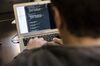 A student uses a Apple Inc. MacBook Air laptop at Le Wagon coding boot camp in Paris, France, on Monday, Jan. 22, 2018. Boris Paillard, who once developed equity and rates models at HSBC’s Paris office, is now co-founder of Le Wagon, a 9-week $8,000 boot camp that teaches computer code to a growing number of bankers, consultants and marketing types.