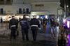 Police patrol outside restaurants in Rome, Oct. 22. 