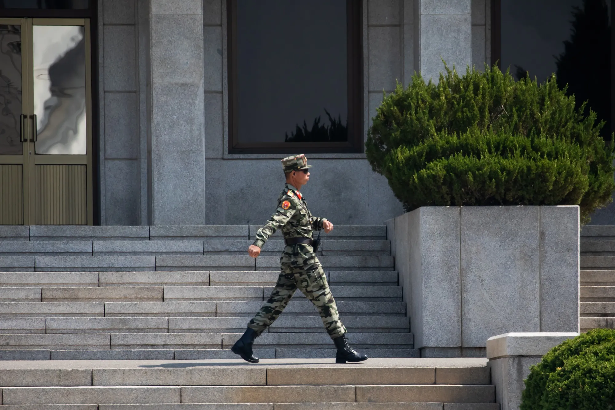 A North Korean soldier outside the Panmungak pavillion on the North Korean side of the border&nbsp;in the truce village of Panmunjom in the Demilitarized Zone (DMZ).