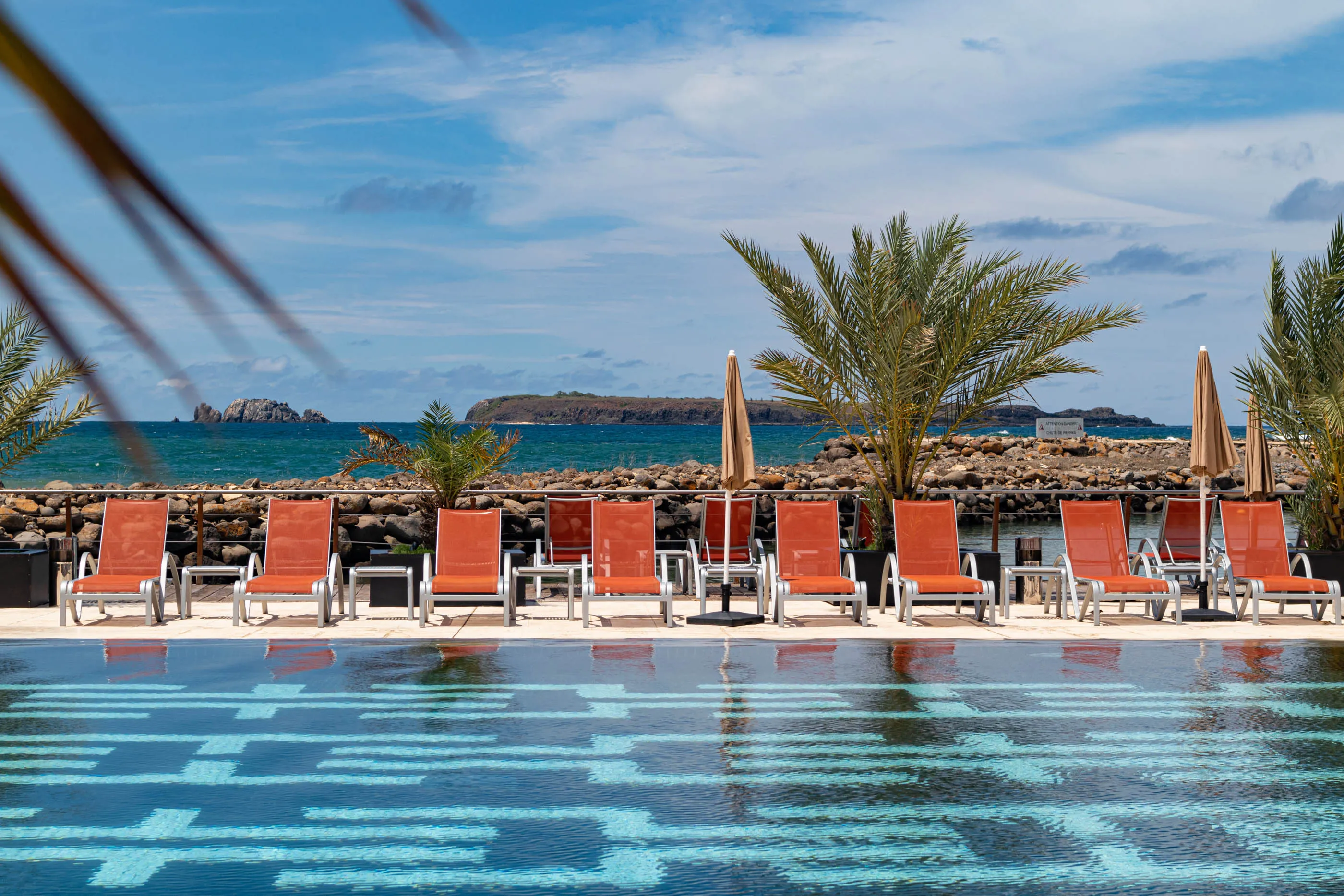 Tangerine loungers line the pool at the newly expanded Terrou-Bi in Dakar.