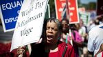 Members of the National Federation of the Blind and other advocacy groups for the disabled demonstrate outside SourceAmerica headquarters in Vienna, Virginia, on Aug. 28, 2014.