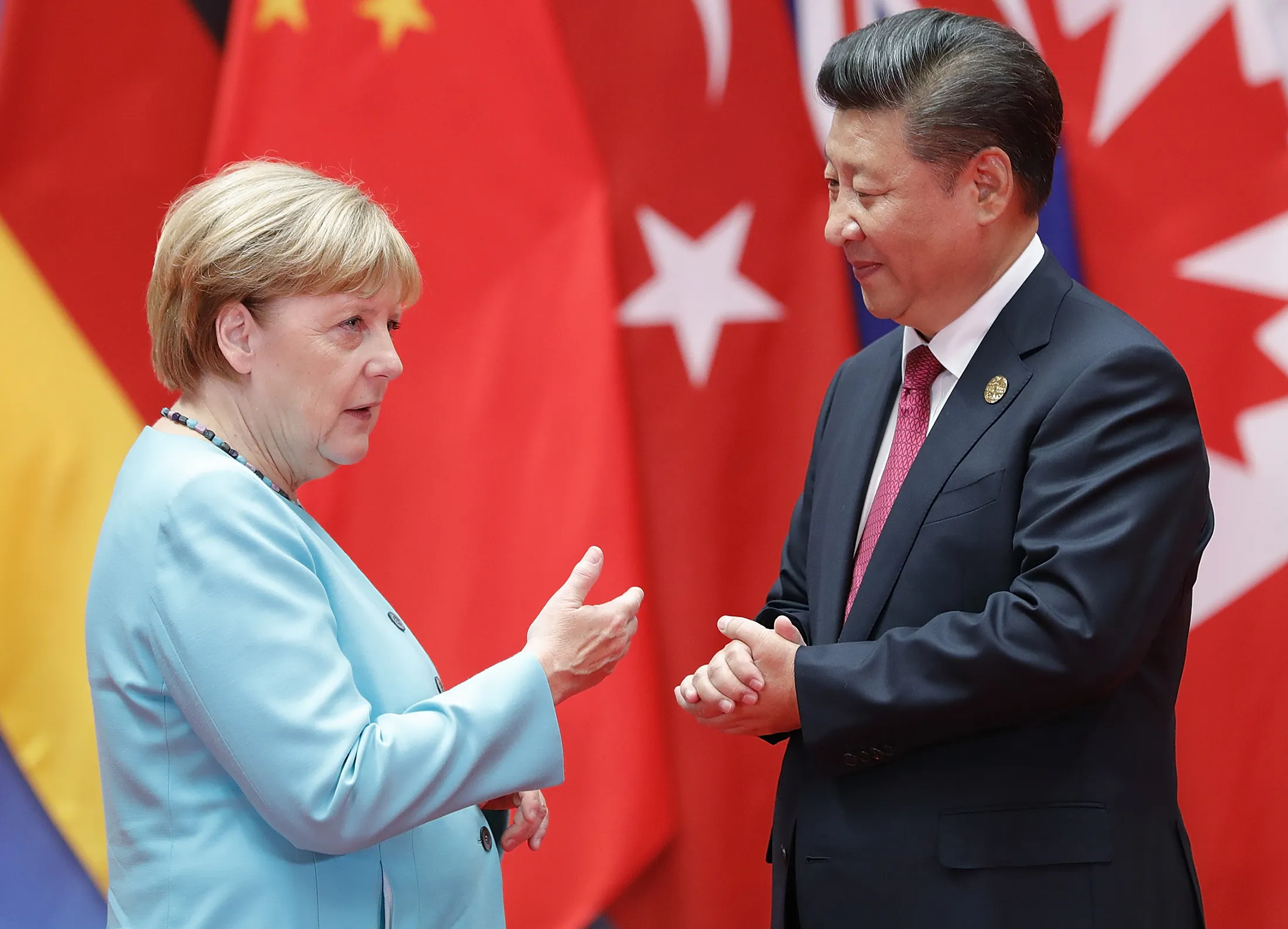 Xi Jinping and Angela Merkel.
