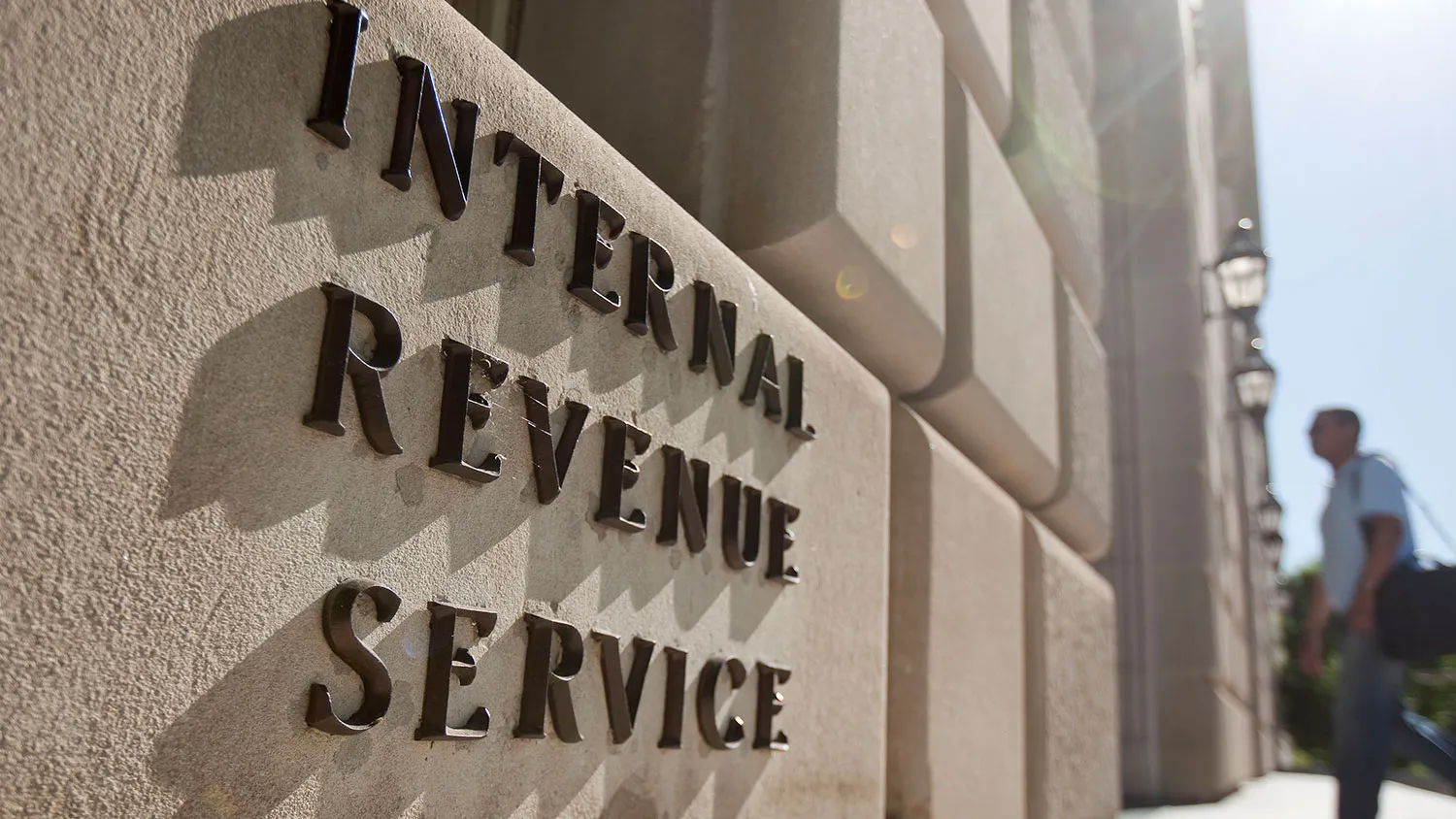 A man enters the Internal Revenue Service (IRS) building in Washington, D.C., U.S., on Friday, May 7, 2010.
