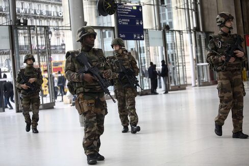 Members of the army patrol at the Gare du Nord train station