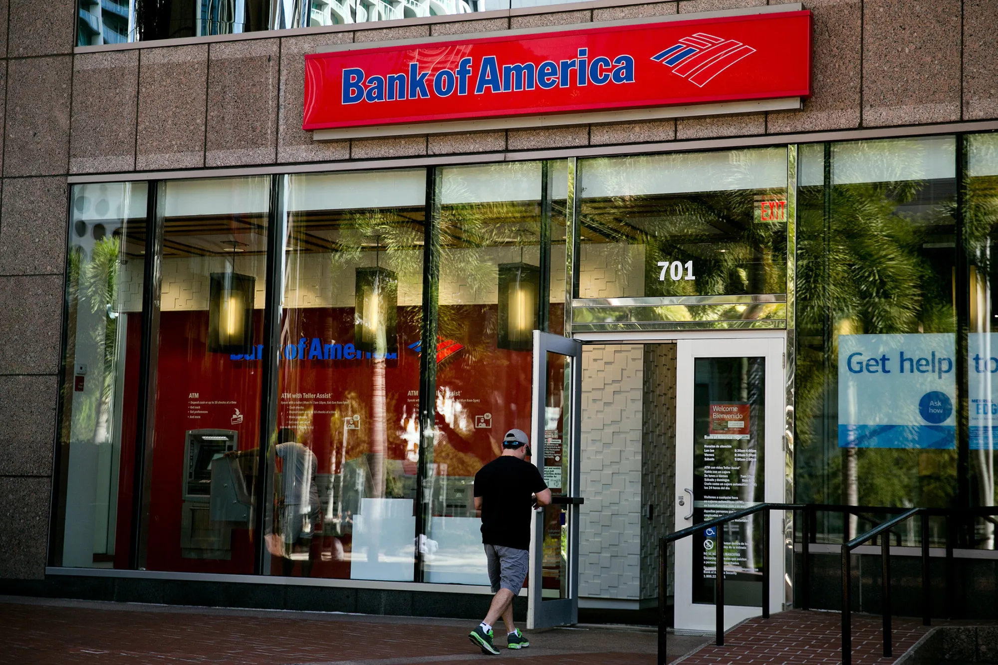 A customer enters a Bank of America Corp. financial center in Miami, Florida, on Jan. 5, 2017.
