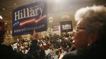 Casino and hotel employees cheer for their preferred presidential candidates before the start of a caucus on Jan. 19, 2008, at the Bellagio Hotel in Las Vegas.
