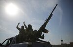 Syrian National Army forces are dispatched to the Manbij front line ahead of Turkey's planned operation in northern Syria on Oct. 8.