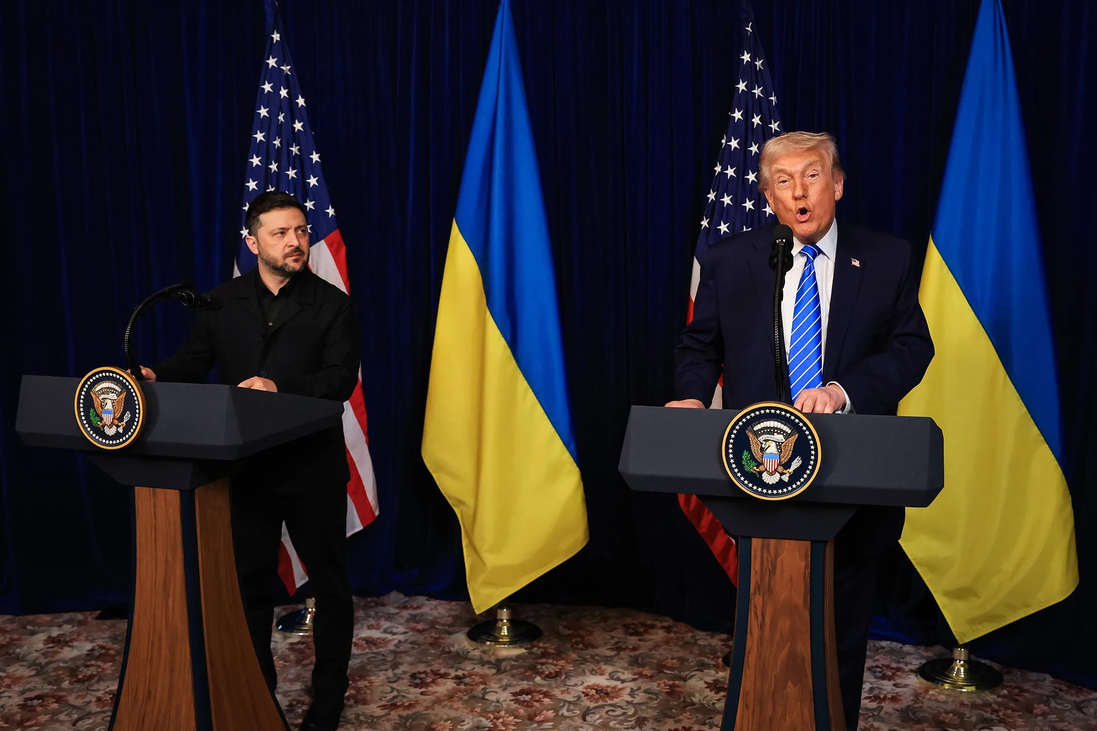 President Donald Trump speaks alongside Ukrainian President Volodymyr Zelenskiy during a press conference following their meeting at Mar-a-Lago in Palm Beach, Florida, on Dec. 28.